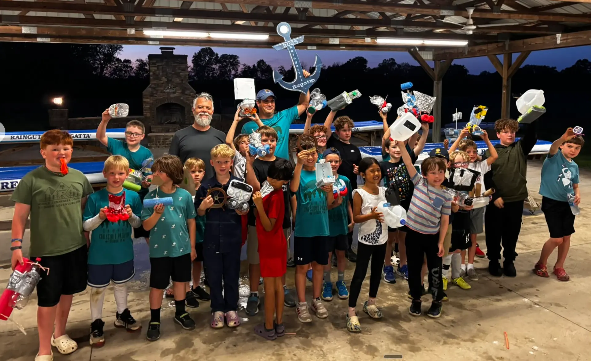 Scouts holding their boats at the Raingutter Regatta